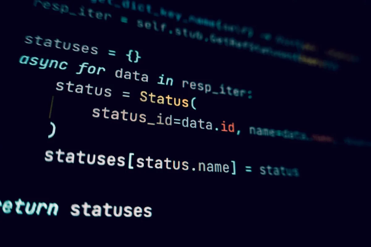 Programming code displayed in a dark theme on a computer screen