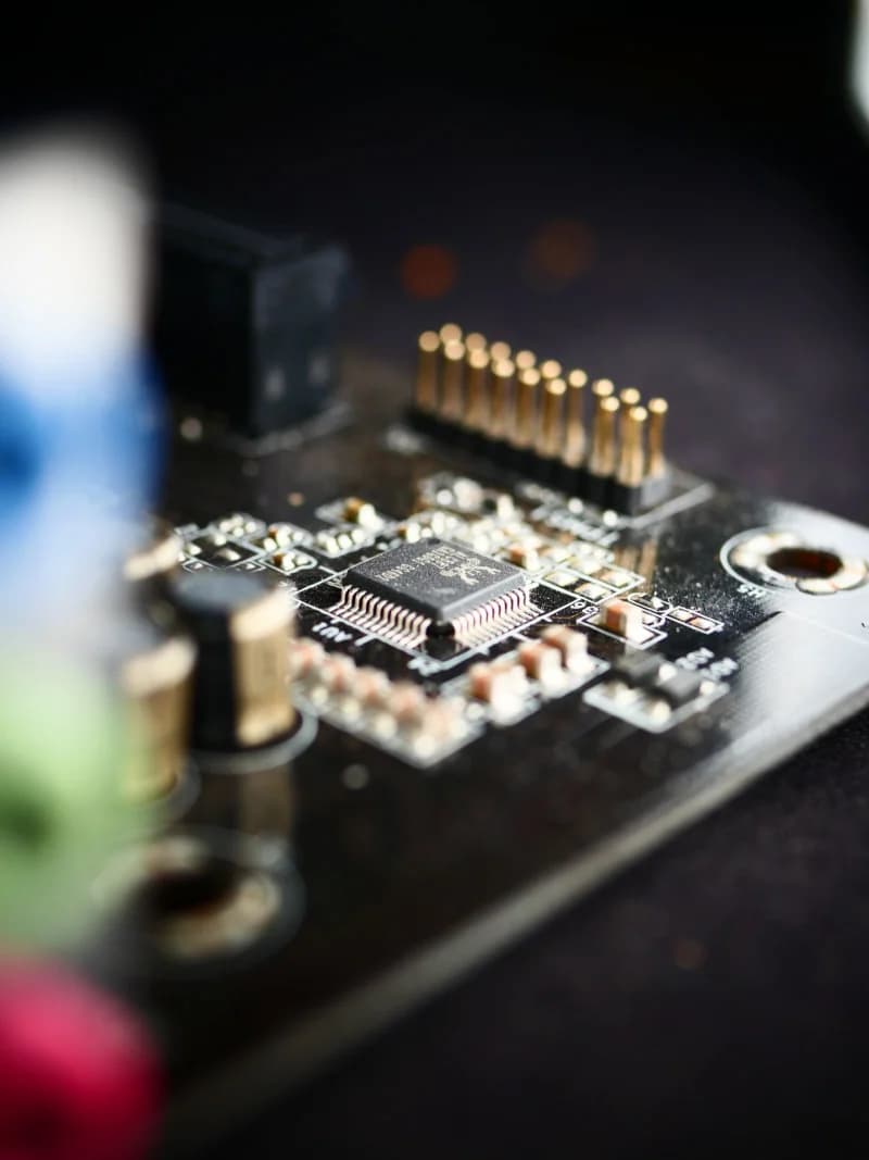 Close-up of a microchip on a circuit board, representing China's domestic AI chips